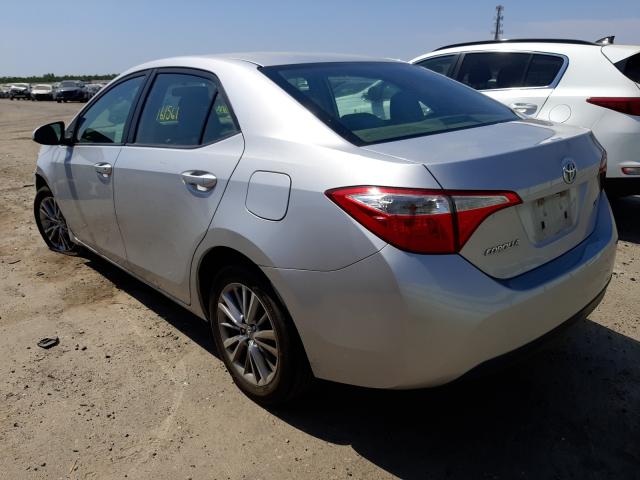 Photo 2 VIN: 5YFBURHEXEP112500 - TOYOTA COROLLA L 