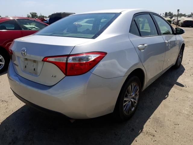 Photo 3 VIN: 5YFBURHEXEP112500 - TOYOTA COROLLA L 