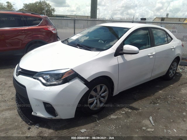 Photo 1 VIN: 5YFBURHEXEP163933 - TOYOTA COROLLA 