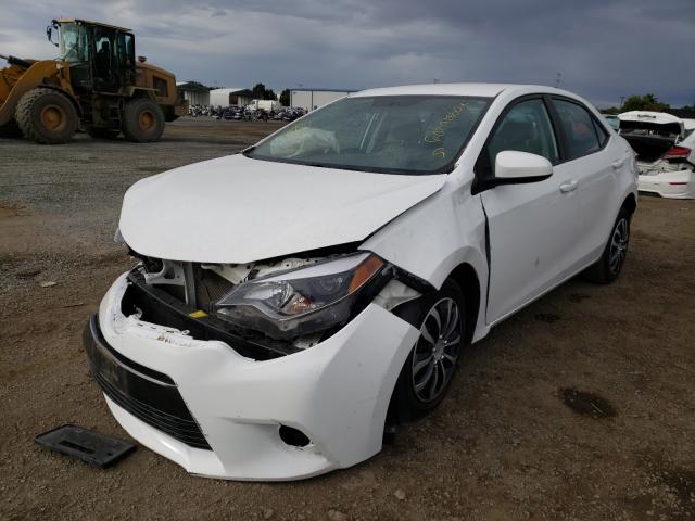 Photo 1 VIN: 5YFBURHEXFP337517 - TOYOTA COROLLA L 