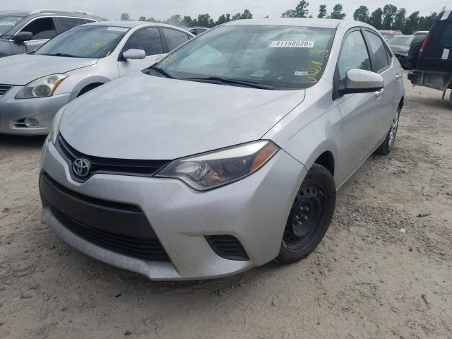 Photo 1 VIN: 5YFBURHEXGP380210 - TOYOTA COROLLA L 