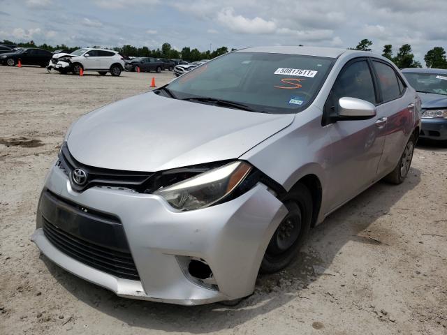 Photo 1 VIN: 5YFBURHEXGP409060 - TOYOTA COROLLA L 