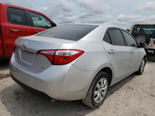 Photo 3 VIN: 5YFBURHEXGP409060 - TOYOTA COROLLA L 