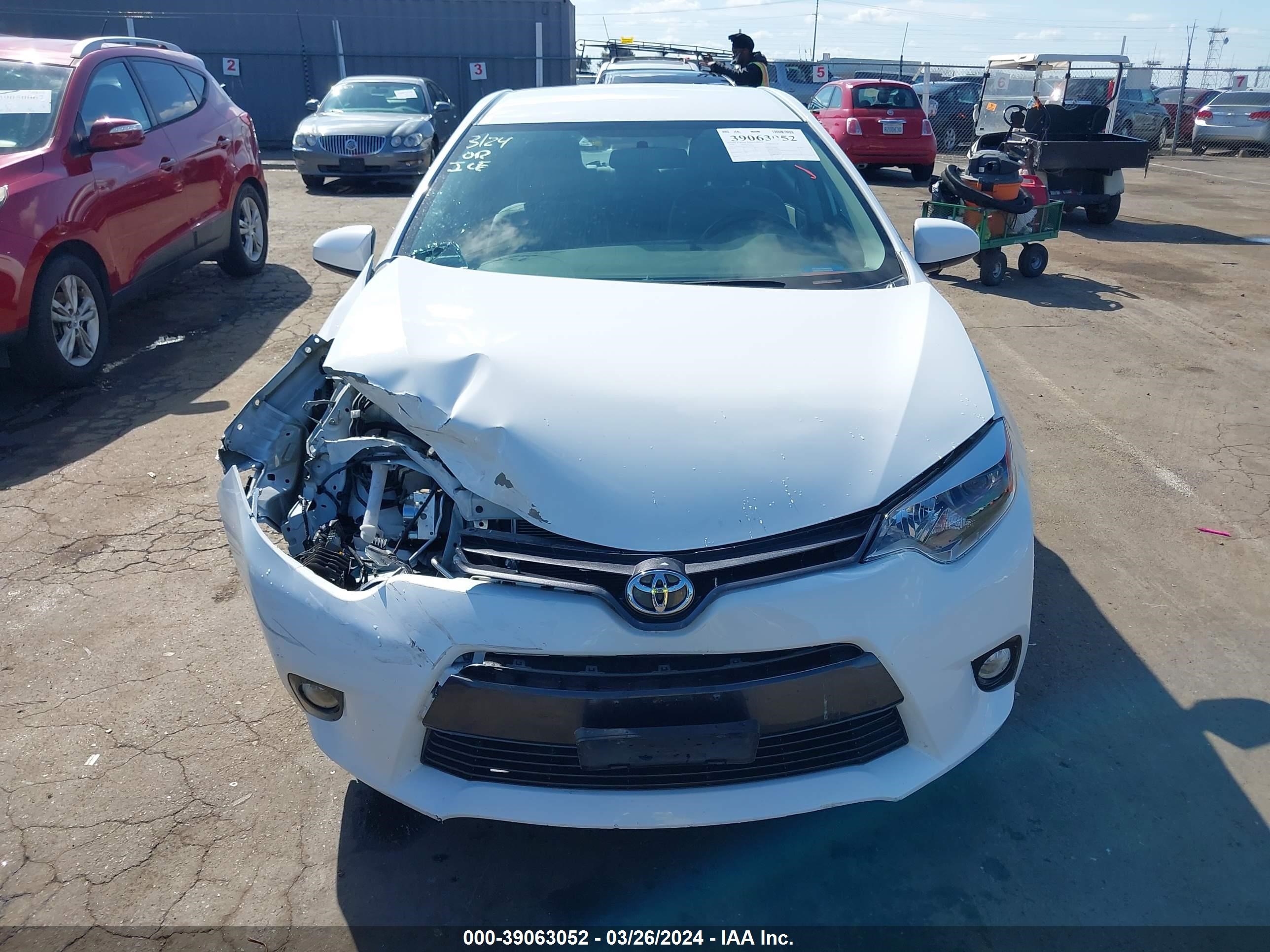 Photo 10 VIN: 5YFBURHEXGP411598 - TOYOTA COROLLA 