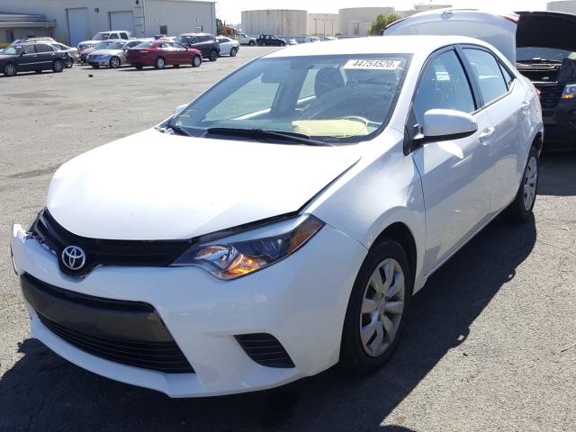 Photo 1 VIN: 5YFBURHEXGP414811 - TOYOTA COROLLA L 