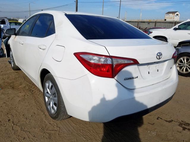 Photo 2 VIN: 5YFBURHEXGP487399 - TOYOTA COROLLA L 