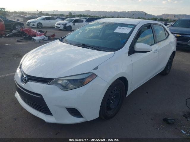 Photo 1 VIN: 5YFBURHEXGP488939 - TOYOTA COROLLA 