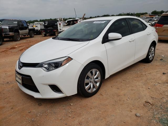 Photo 1 VIN: 5YFBURHEXGP492229 - TOYOTA COROLLA L 