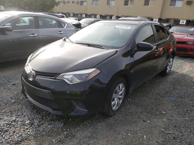 Photo 1 VIN: 5YFBURHEXGP509871 - TOYOTA COROLLA L 