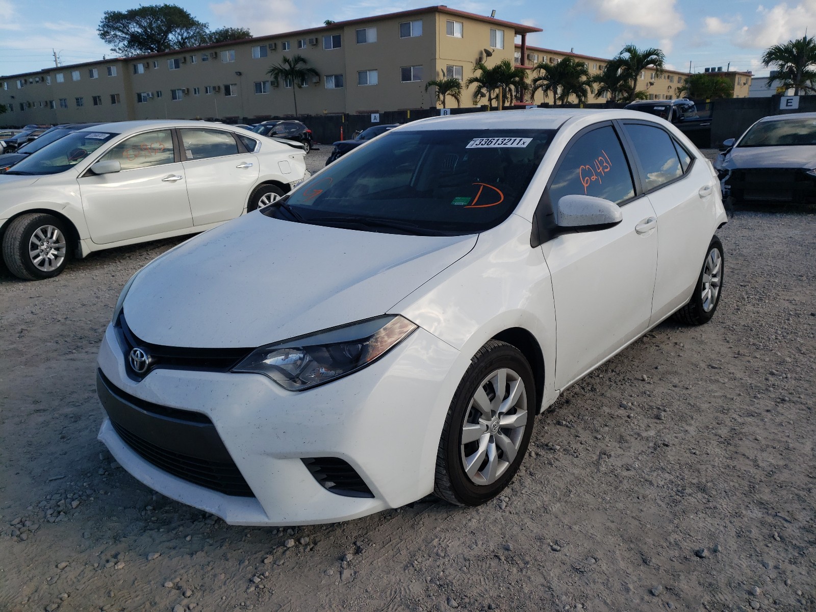 Photo 1 VIN: 5YFBURHEXGP525553 - TOYOTA COROLLA L 