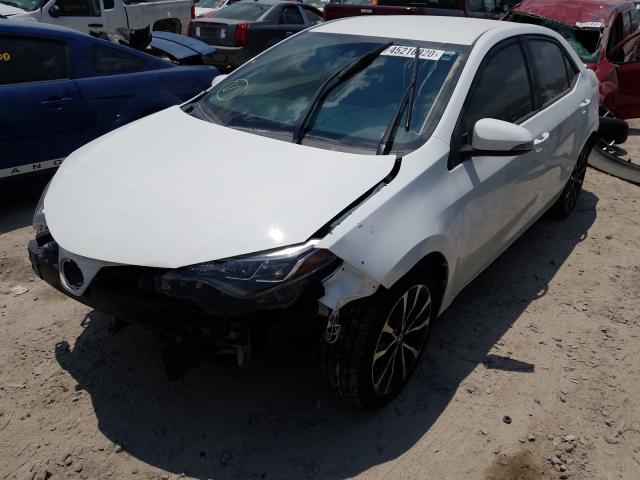 Photo 1 VIN: 5YFBURHEXHP578481 - TOYOTA COROLLA L 