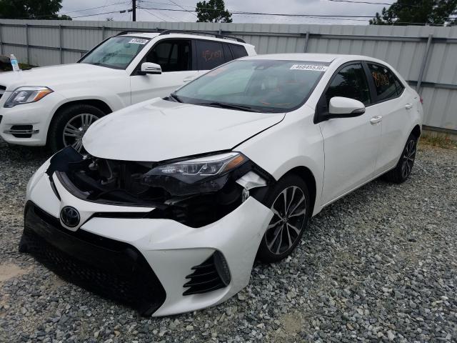 Photo 1 VIN: 5YFBURHEXHP603847 - TOYOTA COROLLA L 