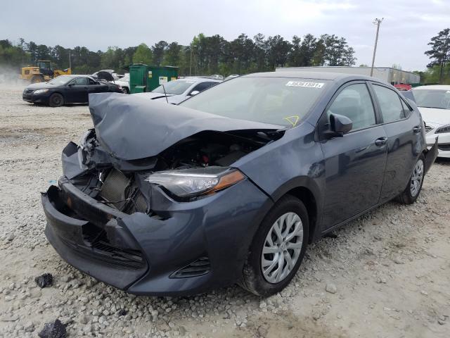 Photo 1 VIN: 5YFBURHEXHP609485 - TOYOTA COROLLA L 