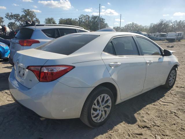 Photo 2 VIN: 5YFBURHEXHP631602 - TOYOTA COROLLA L 