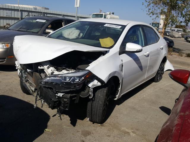 Photo 1 VIN: 5YFBURHEXHP665734 - TOYOTA COROLLA L 