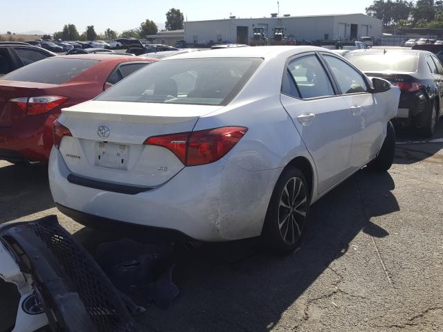 Photo 3 VIN: 5YFBURHEXHP665734 - TOYOTA COROLLA L 