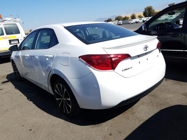 Photo 2 VIN: 5YFBURHEXHP685563 - TOYOTA COROLLA L 