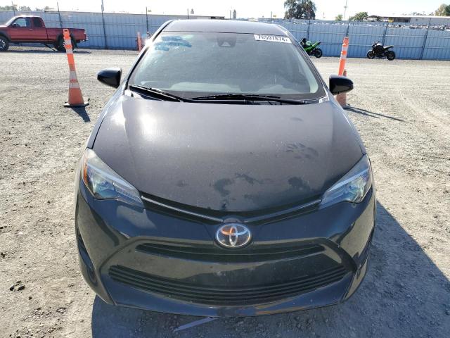 Photo 4 VIN: 5YFBURHEXHP698412 - TOYOTA COROLLA L 