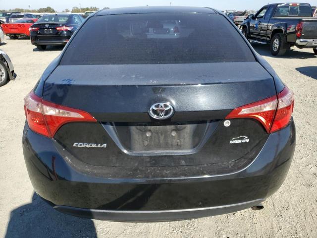 Photo 5 VIN: 5YFBURHEXHP698412 - TOYOTA COROLLA L 