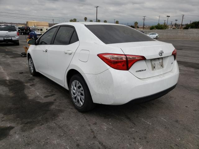 Photo 2 VIN: 5YFBURHEXHP702930 - TOYOTA COROLLA L 