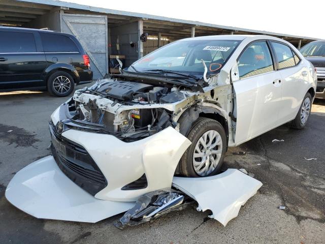 Photo 1 VIN: 5YFBURHEXHP710994 - TOYOTA COROLLA L 