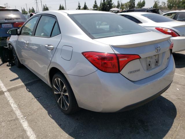 Photo 2 VIN: 5YFBURHEXHP711658 - TOYOTA COROLLA L 