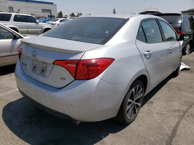 Photo 3 VIN: 5YFBURHEXHP711658 - TOYOTA COROLLA L 