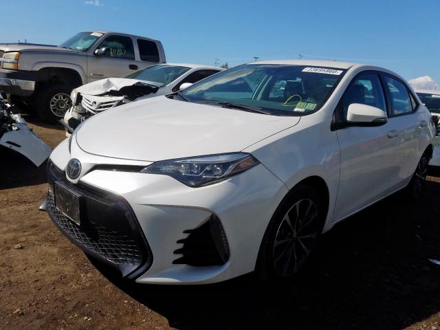 Photo 1 VIN: 5YFBURHEXHP720165 - TOYOTA COROLLA L 