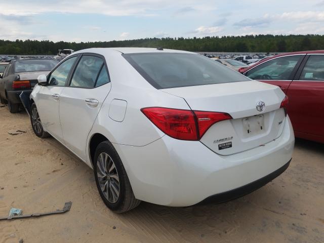 Photo 2 VIN: 5YFBURHEXJP746562 - TOYOTA COROLLA L 