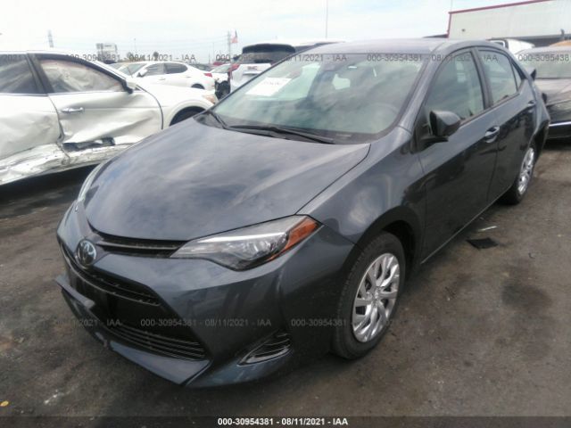 Photo 1 VIN: 5YFBURHEXJP746576 - TOYOTA COROLLA 