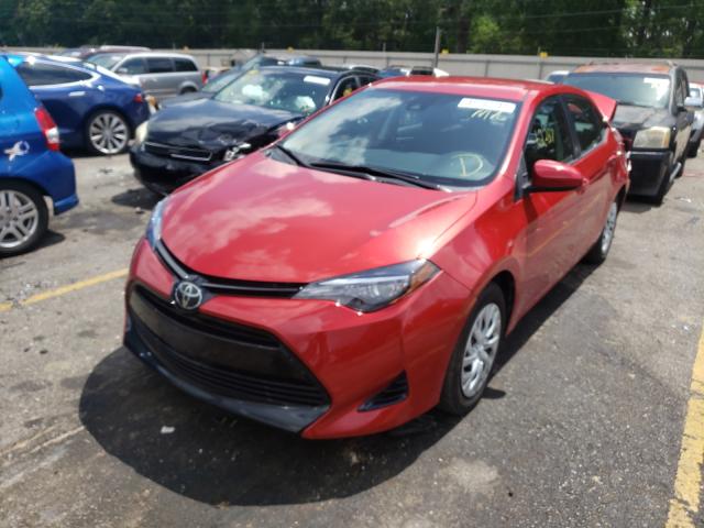 Photo 1 VIN: 5YFBURHEXJP749333 - TOYOTA COROLLA L 