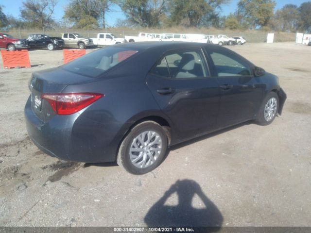 Photo 3 VIN: 5YFBURHEXJP750241 - TOYOTA COROLLA 