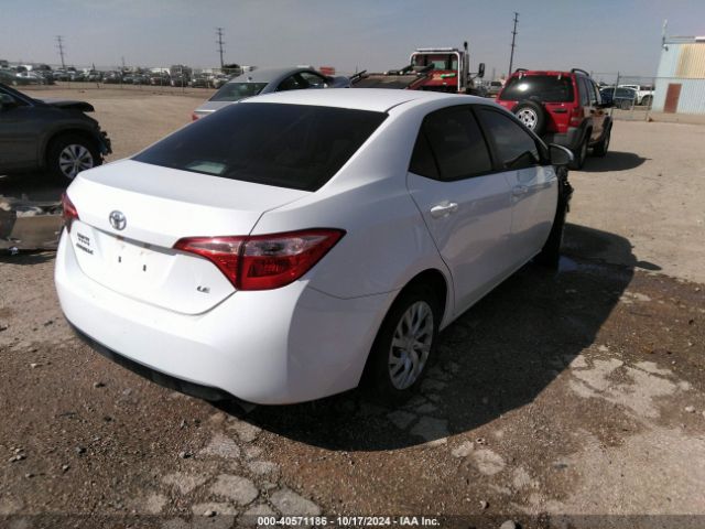 Photo 3 VIN: 5YFBURHEXJP750787 - TOYOTA COROLLA 