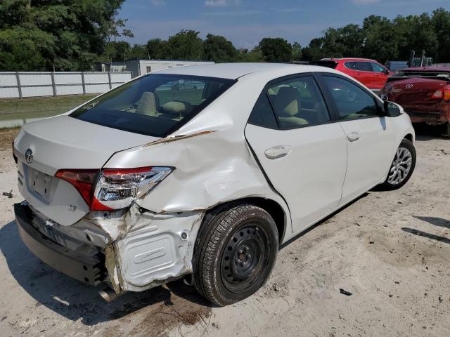 Photo 2 VIN: 5YFBURHEXJP765516 - TOYOTA COROLLA L 