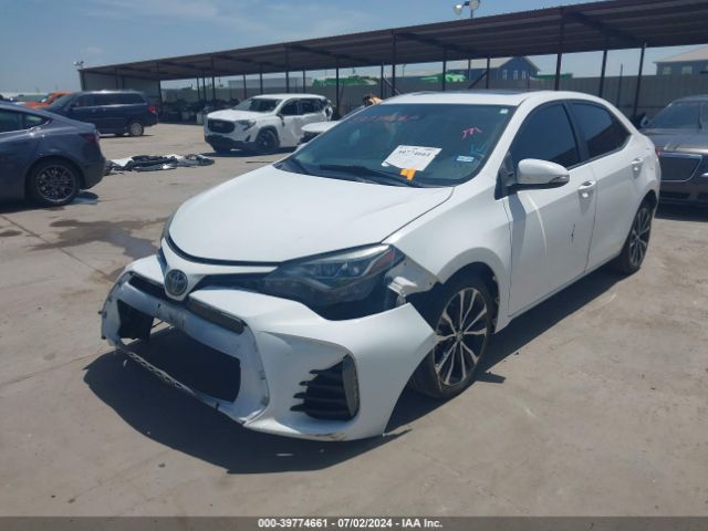 Photo 1 VIN: 5YFBURHEXJP766990 - TOYOTA COROLLA 