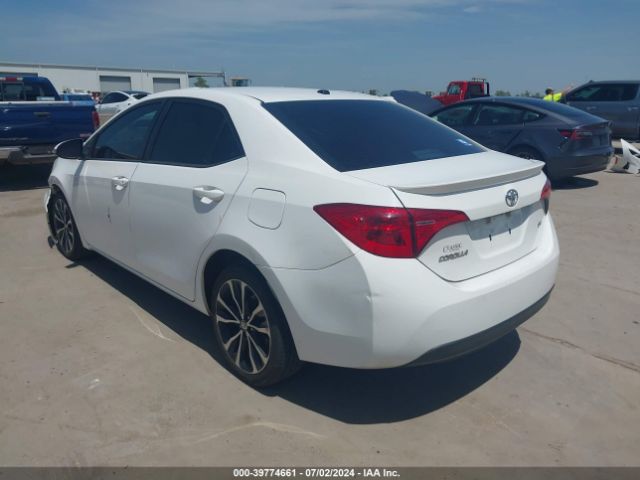 Photo 2 VIN: 5YFBURHEXJP766990 - TOYOTA COROLLA 