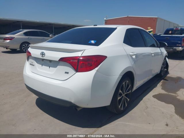 Photo 3 VIN: 5YFBURHEXJP766990 - TOYOTA COROLLA 