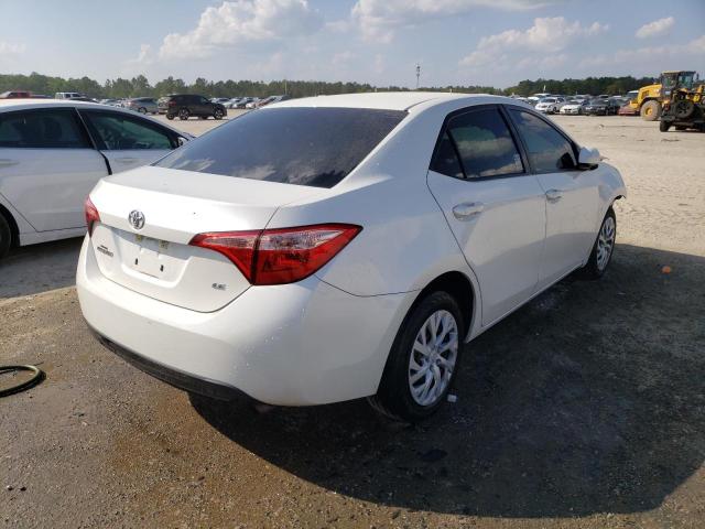 Photo 2 VIN: 5YFBURHEXJP768304 - TOYOTA COROLLA L 