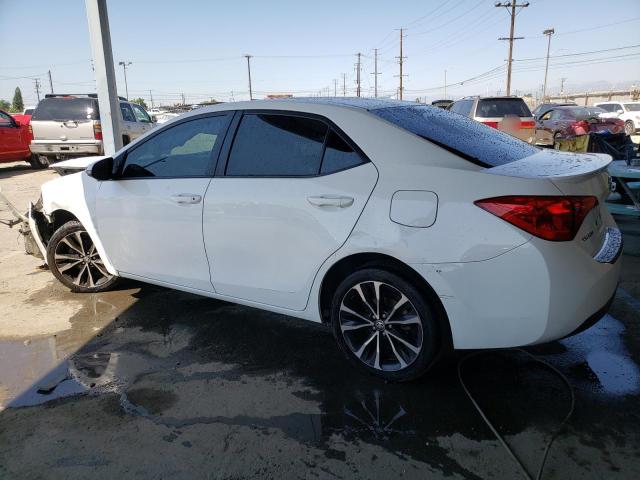 Photo 1 VIN: 5YFBURHEXJP769596 - TOYOTA COROLLA 