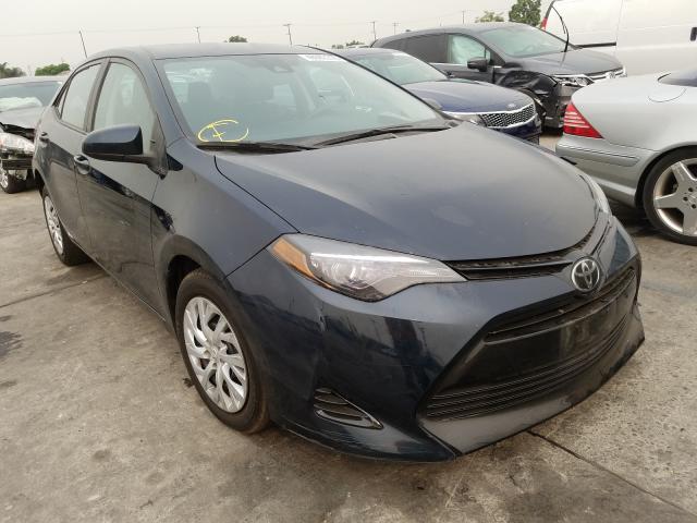 Photo 0 VIN: 5YFBURHEXJP769677 - TOYOTA COROLLA L 