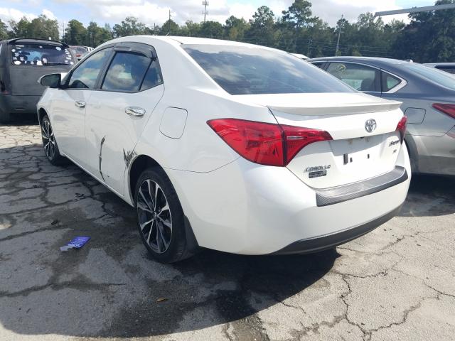 Photo 2 VIN: 5YFBURHEXJP774183 - TOYOTA COROLLA L 