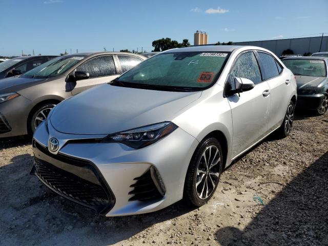 Photo 1 VIN: 5YFBURHEXJP807523 - TOYOTA COROLLA L 