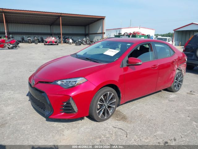 Photo 1 VIN: 5YFBURHEXJP810521 - TOYOTA COROLLA 