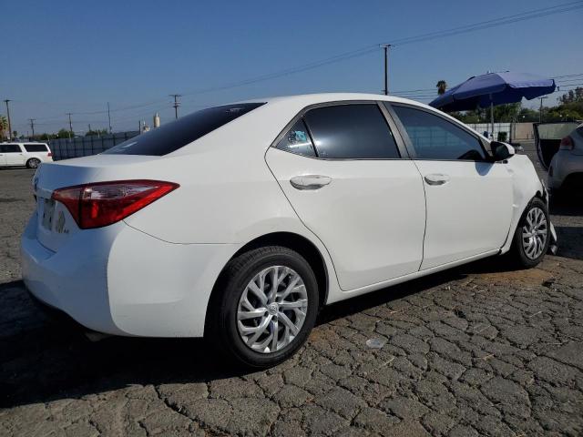 Photo 2 VIN: 5YFBURHEXJP817789 - TOYOTA COROLLA L 