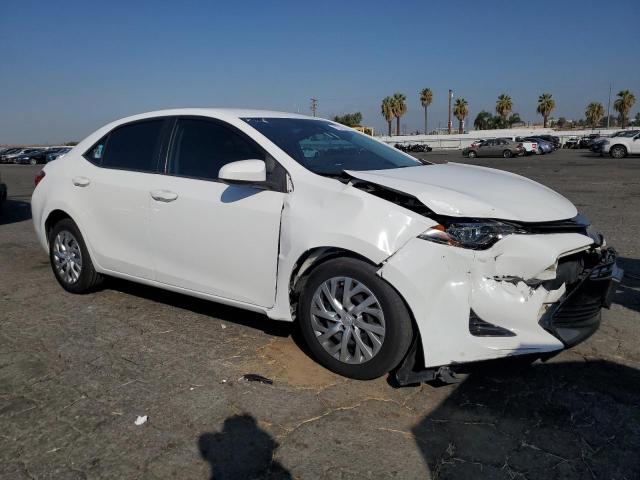 Photo 3 VIN: 5YFBURHEXJP817789 - TOYOTA COROLLA L 