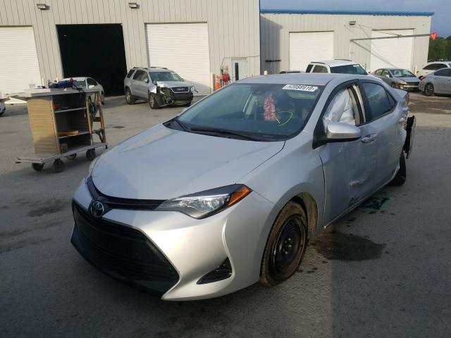 Photo 1 VIN: 5YFBURHEXJP849478 - TOYOTA COROLLA L 