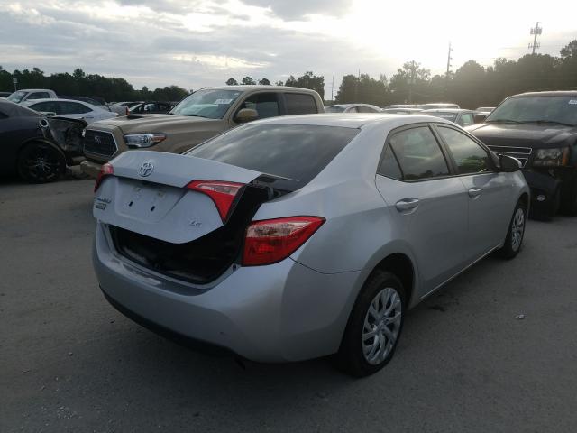 Photo 3 VIN: 5YFBURHEXJP849478 - TOYOTA COROLLA L 