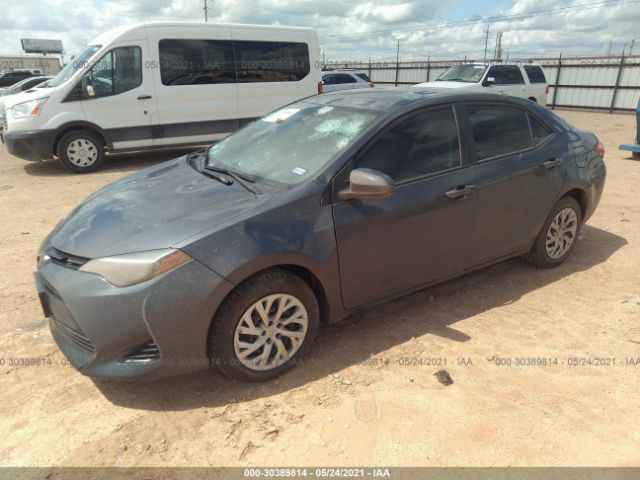 Photo 1 VIN: 5YFBURHEXKP857209 - TOYOTA COROLLA 