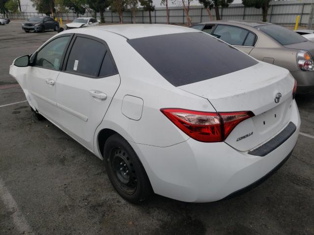 Photo 2 VIN: 5YFBURHEXKP858327 - TOYOTA COROLLA L 