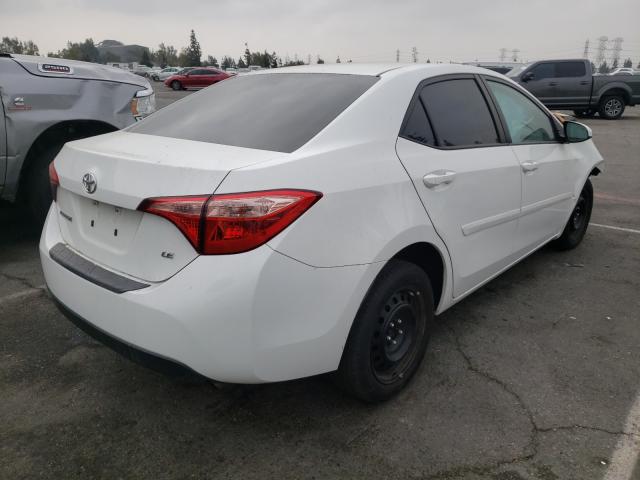 Photo 3 VIN: 5YFBURHEXKP858327 - TOYOTA COROLLA L 